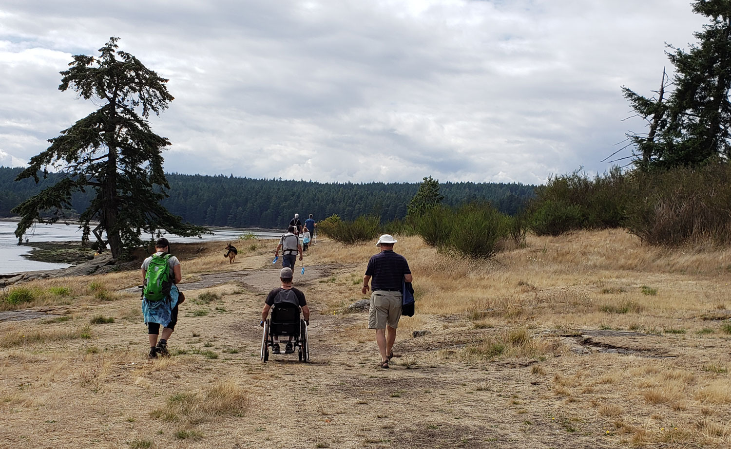 People on trail at Drumbeg Provincial Park; one is in a wheelchair.