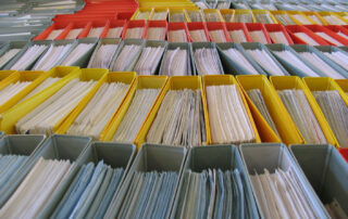 Huge mass of binders full of documents