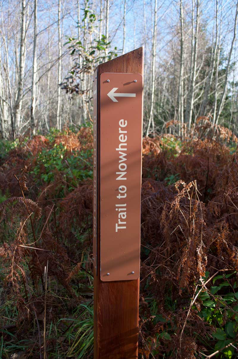 Photo of a trail post marker labelled "Trail to Nowhere."