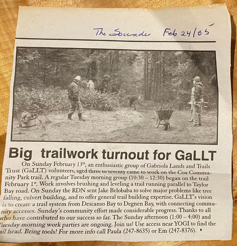 The photo shows a newspaper clipping from February 24th, 2005. The headline is "Big trailwork turnout for GaLTT" and the text describes a trail workparty in Cox Park.